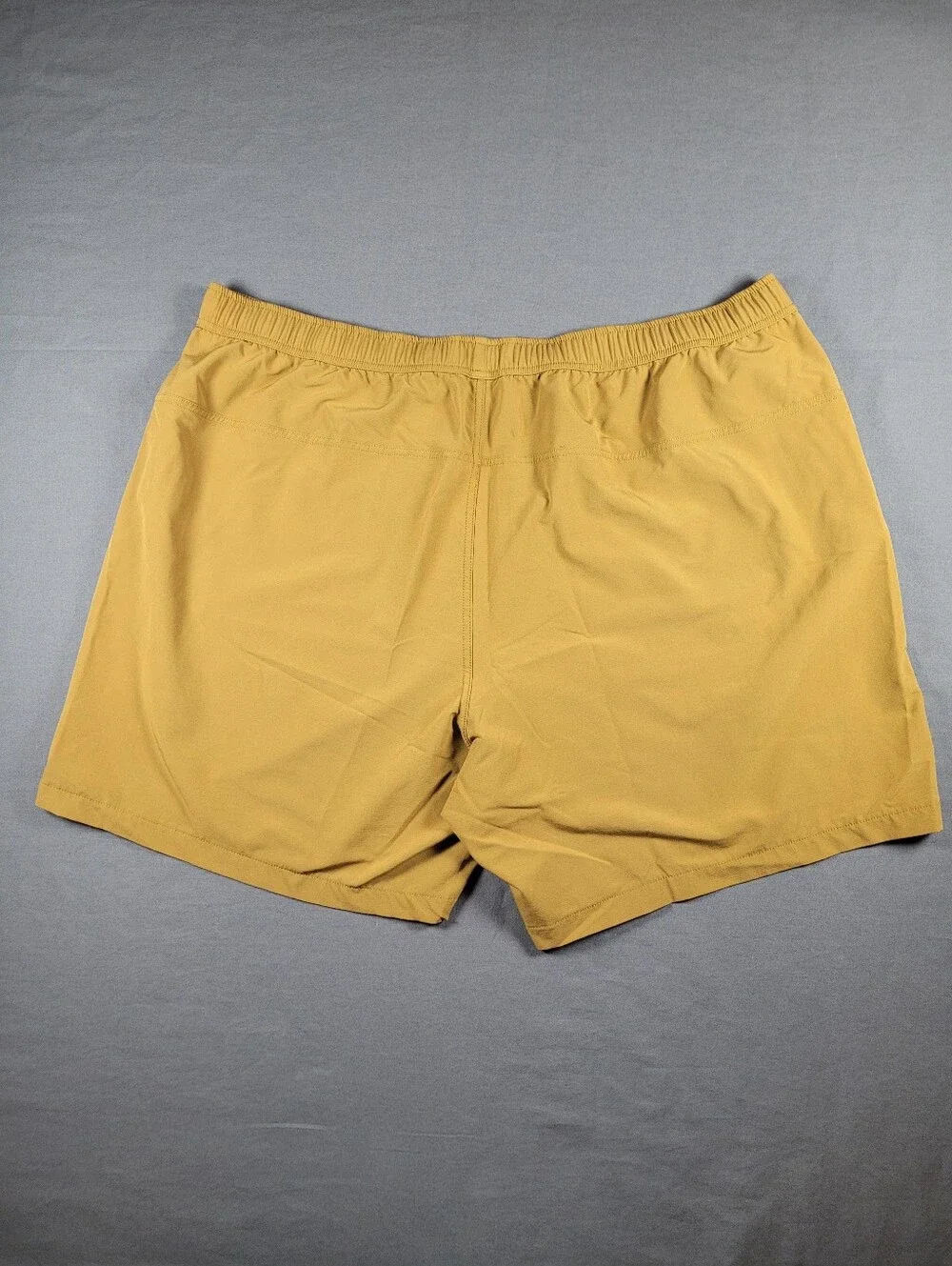 Janji Running Trail Shorts XL Golden Tan Zip Pockets Stretch Activewear